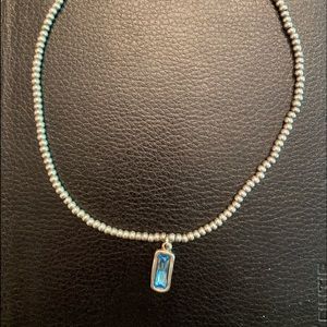 UNO de 50 aquamarine colored stone